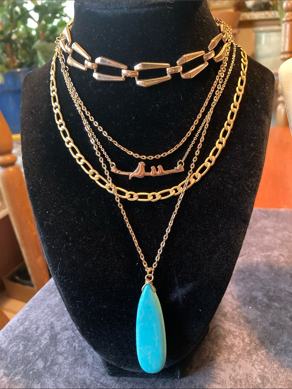 Four piece, gold tone, jewelry bundle